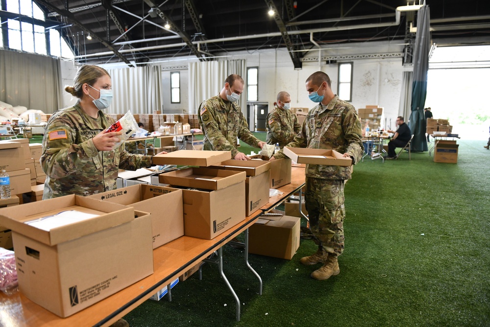 National Guard builds 350,000 testing kits in 2 days.