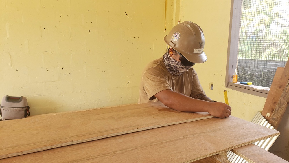 U.S. Navy Seabees with NMCB-5’s Detail Pohnpei build head and shower facilities to help prepare a COVID-19 response compound