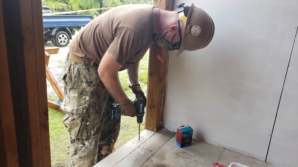 U.S. Navy Seabees with NMCB-5’s Detail Pohnpei build head and shower facilities to help prepare a COVID-19 response compound