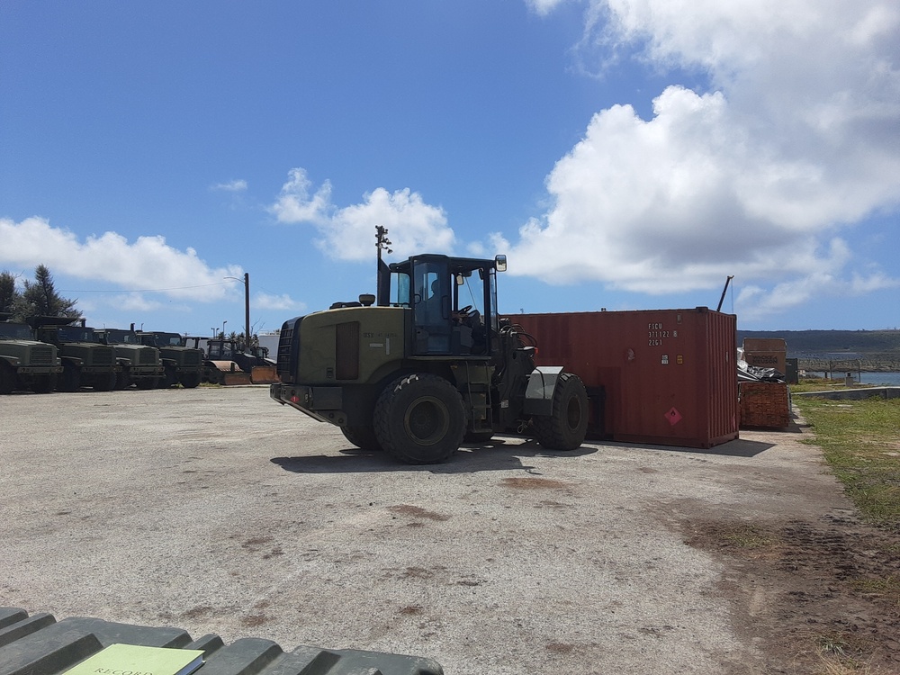 U.S. Navy Seabees with NMCB-5’s Detail Tinian inventory gear