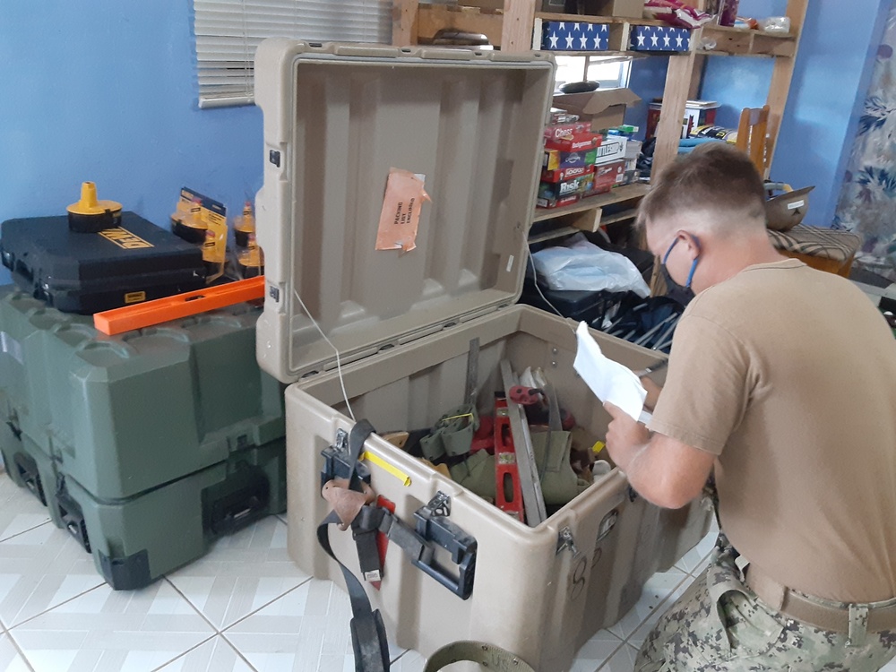 U.S. Navy Seabees with NMCB-5’s Detail Tinian inventory gear