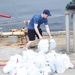 Sailors aboard USS Blue Ridge receive deliveries from Army Airforce Exchange Service (AAFES)