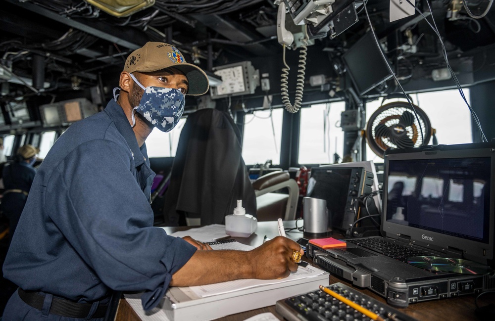 Sailors Aboard USS John S. McCain (DDG 56) Stand Bridge Watches Underway