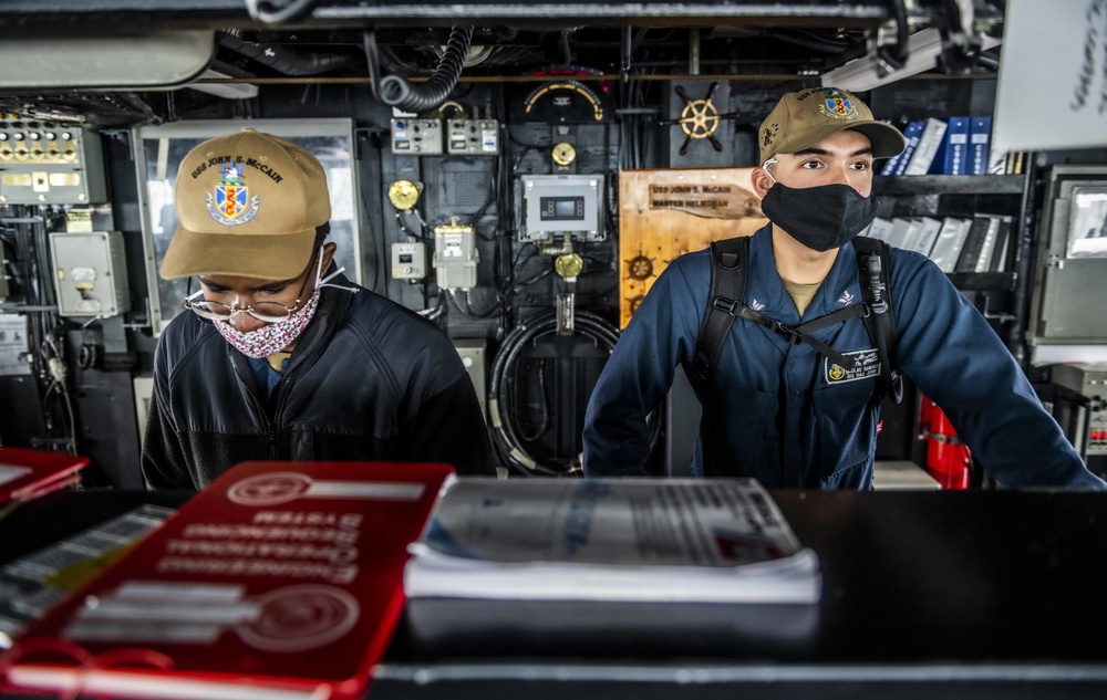 Sailors Aboard USS John S. McCain (DDG 56) Stand Bridge Watches Underway