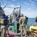 Navy Divers Conduct Dives from USNS Apache
