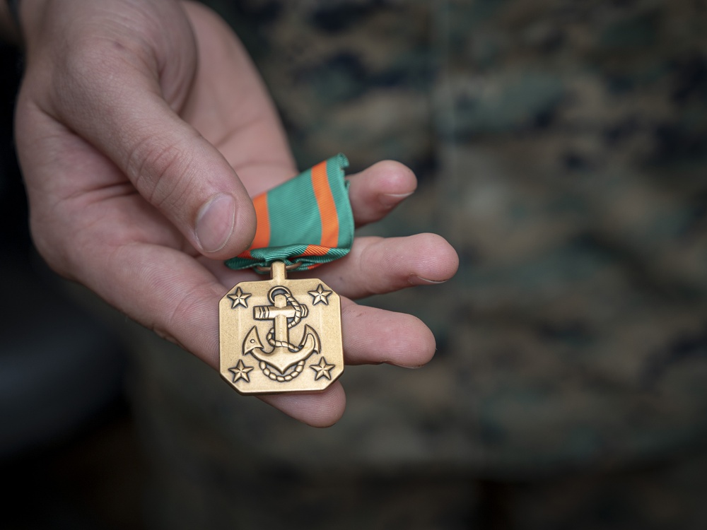 Marine Receives Award from Navy