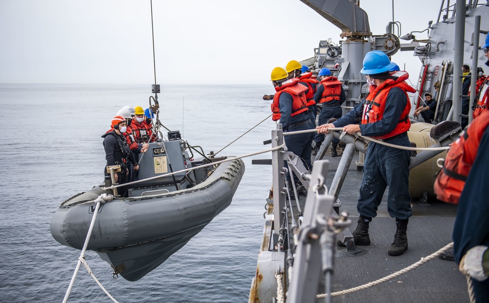 Sailors Conduct RHIB Operations Aboard USS John S. McCain (DDG 56)