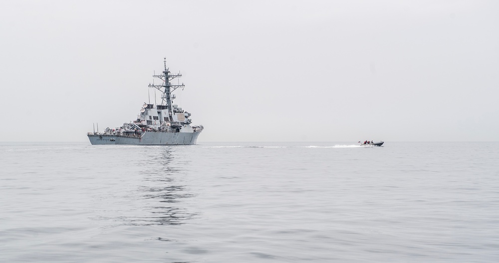 Sailors Conduct RHIB Operations Aboard USS John S. McCain (DDG 56)