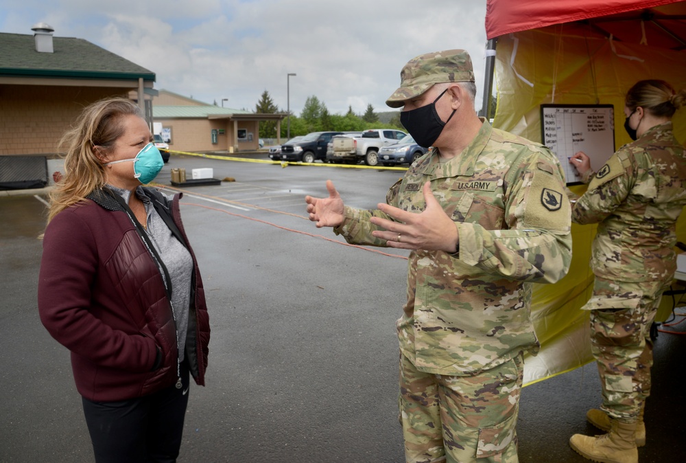 Washington Guardsmen work in partnership with the Quinault Indian Nation