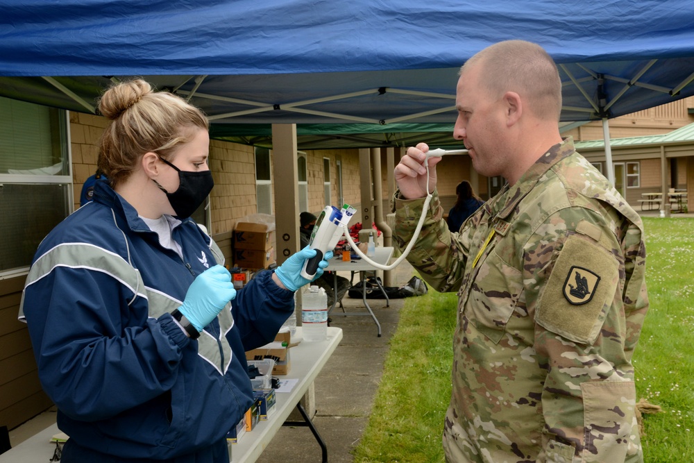 Washington Guardsmen work in partnership with the Quinault Indian Nation