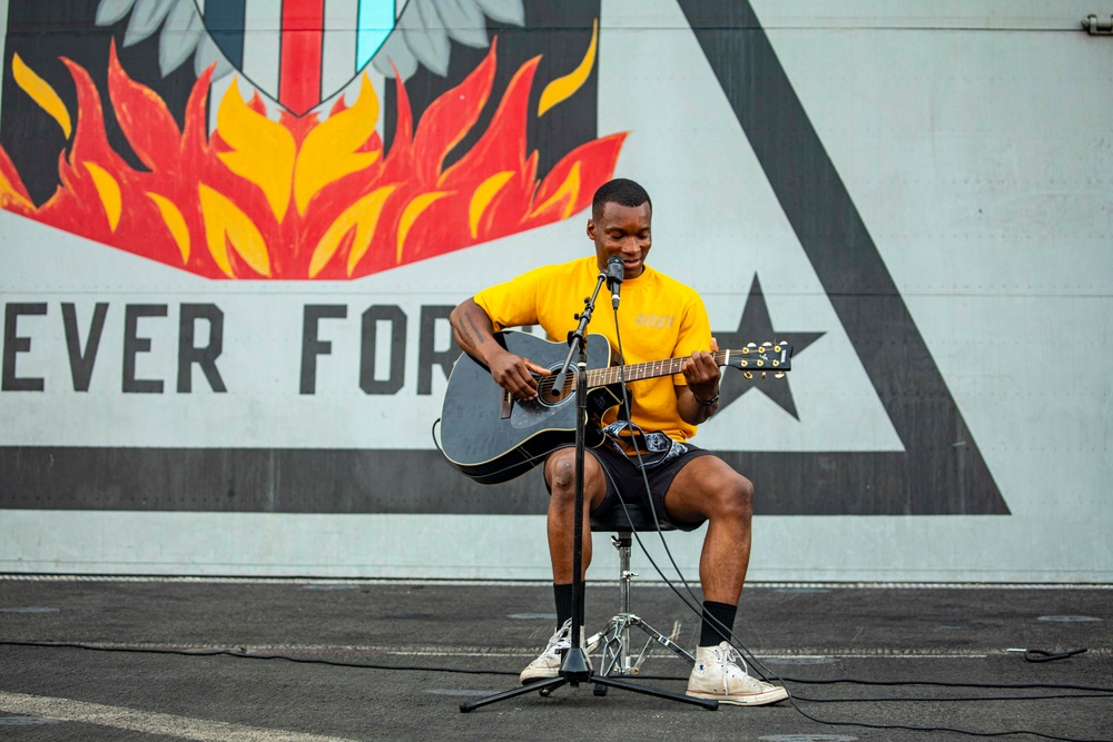 Sailors take part in a talent show