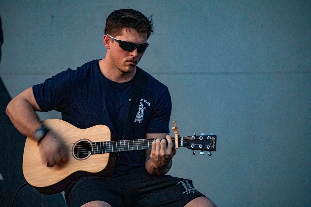 Sailors take part in a talent show