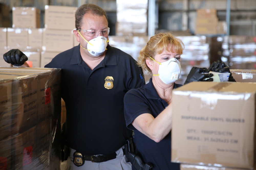 ICE HSI Special Agents inspect international cargo at Los Angeles area airport