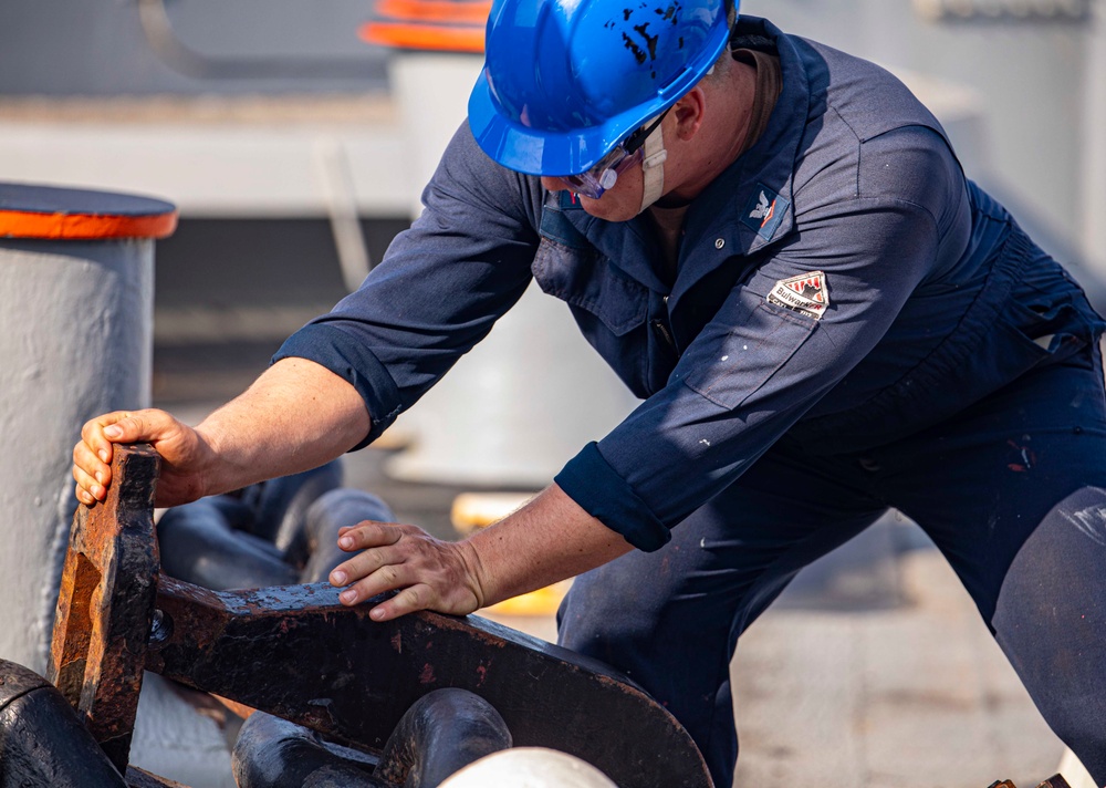 Sailors take part in an anchoring evolution