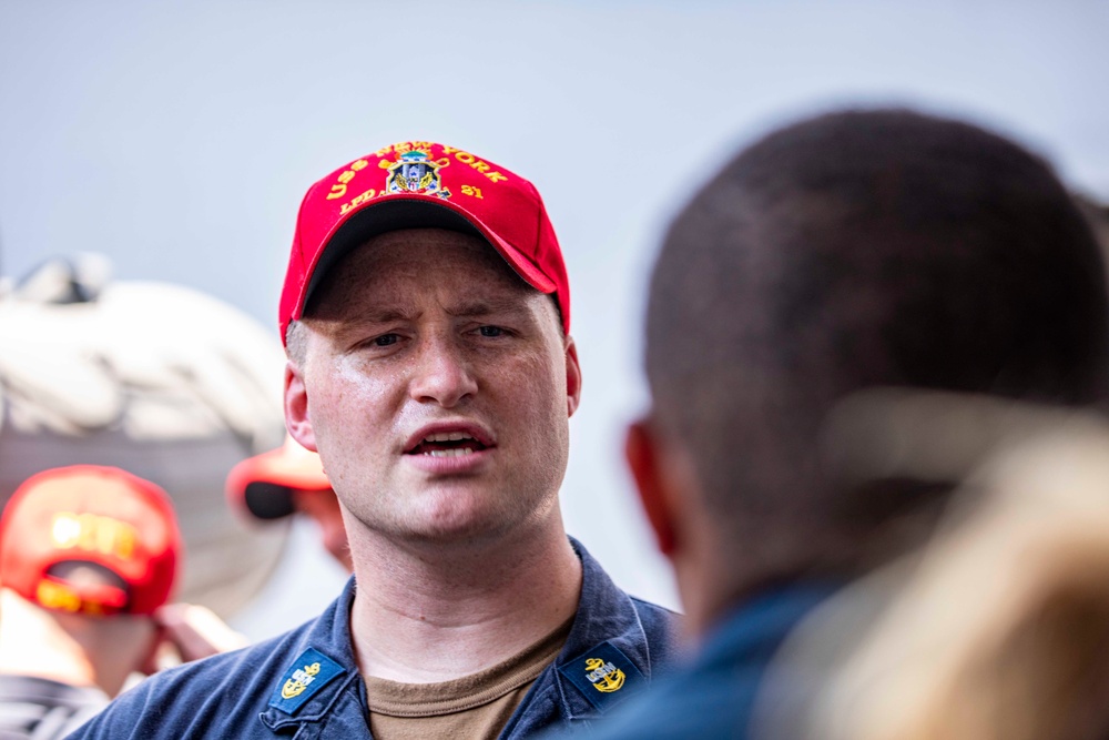 Sailors take part in a hazmat spill training