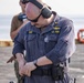 Sailors take part in a weapons qualification