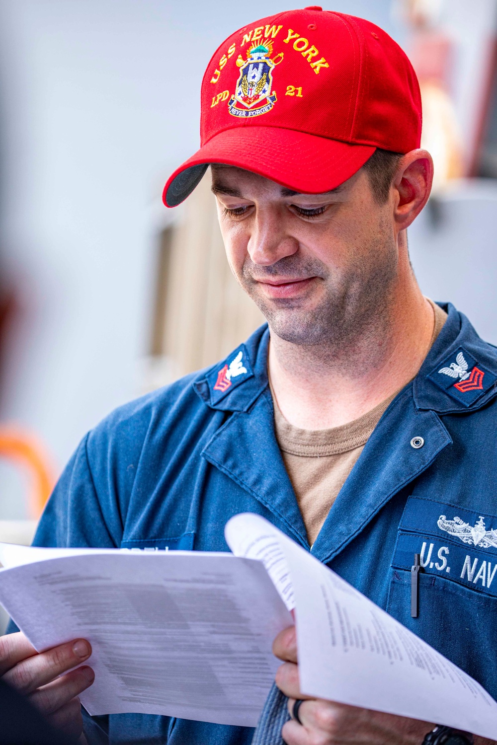 Sailors take part in a hazmat spill training