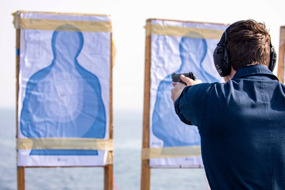 Sailors take part in a weapons qualification