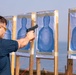 Sailors take part in a weapons qualification