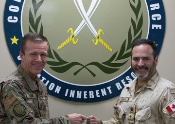 CJTF-OIR distinguished visitor book signing