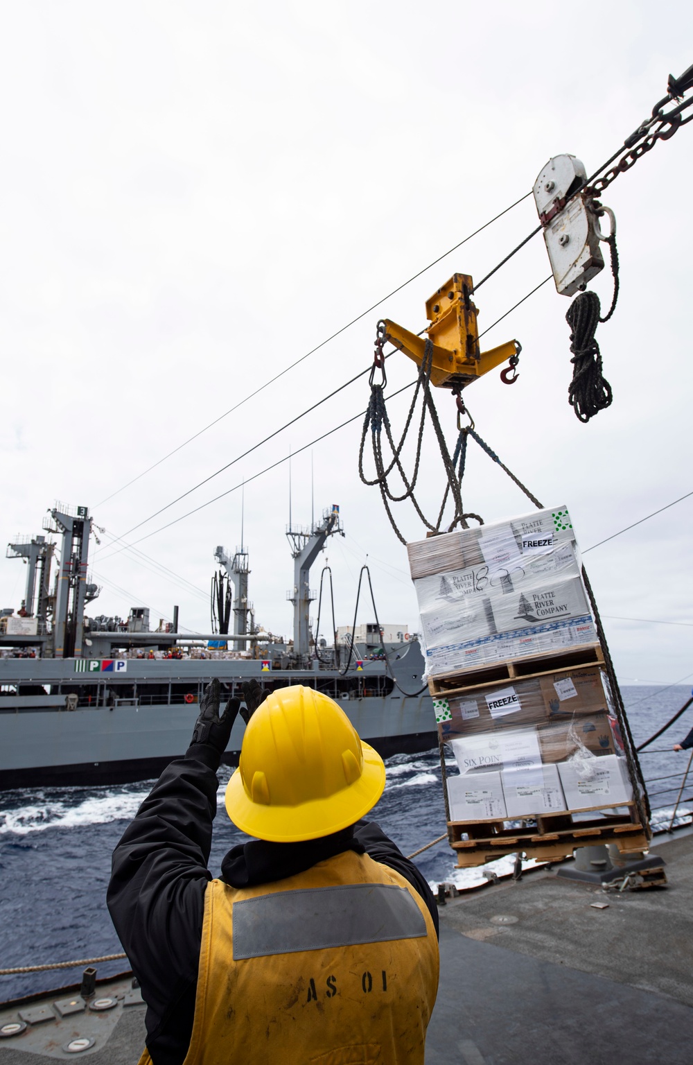 Sterett and Henry J. Kaiser participate in a replenishment-at-sea