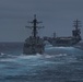 USS Ralph Johnson (DDG 114) and USS Nimitz (CVN 68) transit the Pacific Ocean