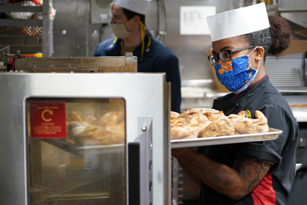 Culinary Specialist prepares food aboard USS Halsey