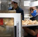 Culinary Specialist prepares food aboard USS Halsey