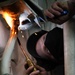 Hull Technician aboard USS Halsey braise welds