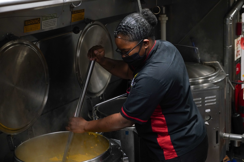 Culinary Specialist prepares food aboard USS Halsey