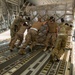 U.S. Airmen unload cargo from C-17 Globemaster III