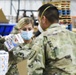 Soldiers assemble emergency kits at LA Regional Food Bank