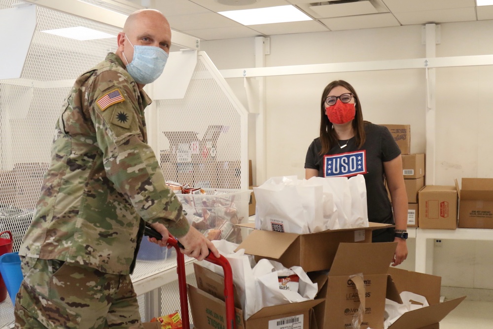Cal Guard Chaplain brings USO morale bags to medical teams