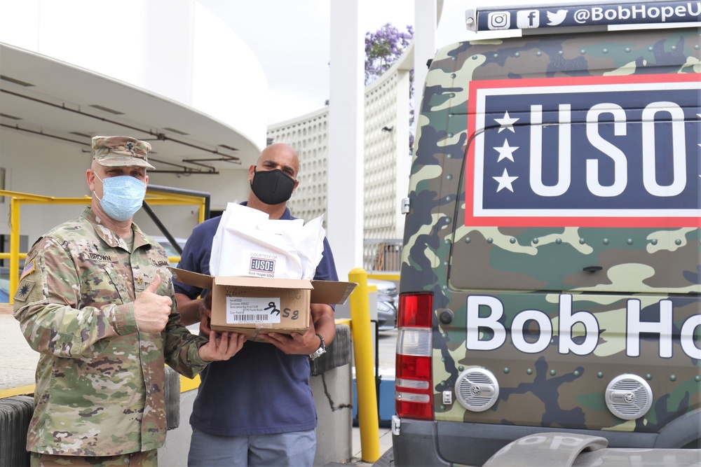 Cal Guard Chaplain brings USO morale bags to medical teams