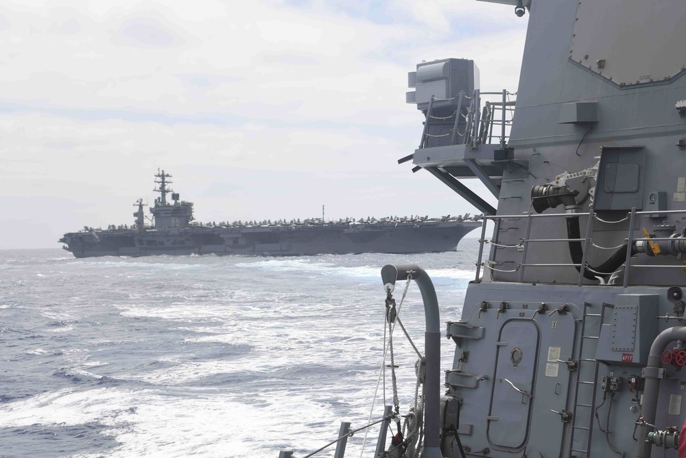 USS Ralph Johnson Conducts Replenishment-At-Sea