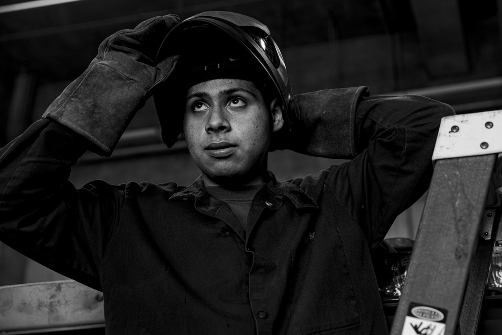 Bright Burn | 3rd MLG metal worker welds a Quadcon