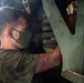 U.S. Marines perform maintenance on a fleet of tactical vehicles