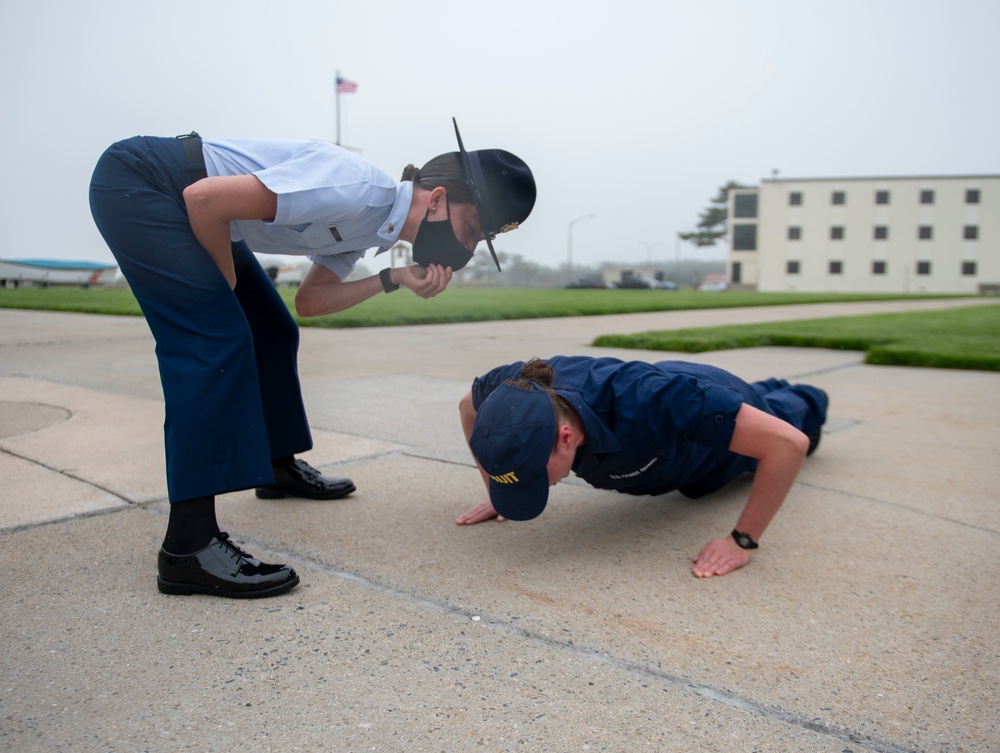 CAPE MAY, N.J. - Recruits from forming company Sierra 198 are greeted by their company commanders during a ceremony at U.S. Coast Guard Training Center Cape May, May 28, 2020. Training Center Cape May serves the American public by leveraging the talent