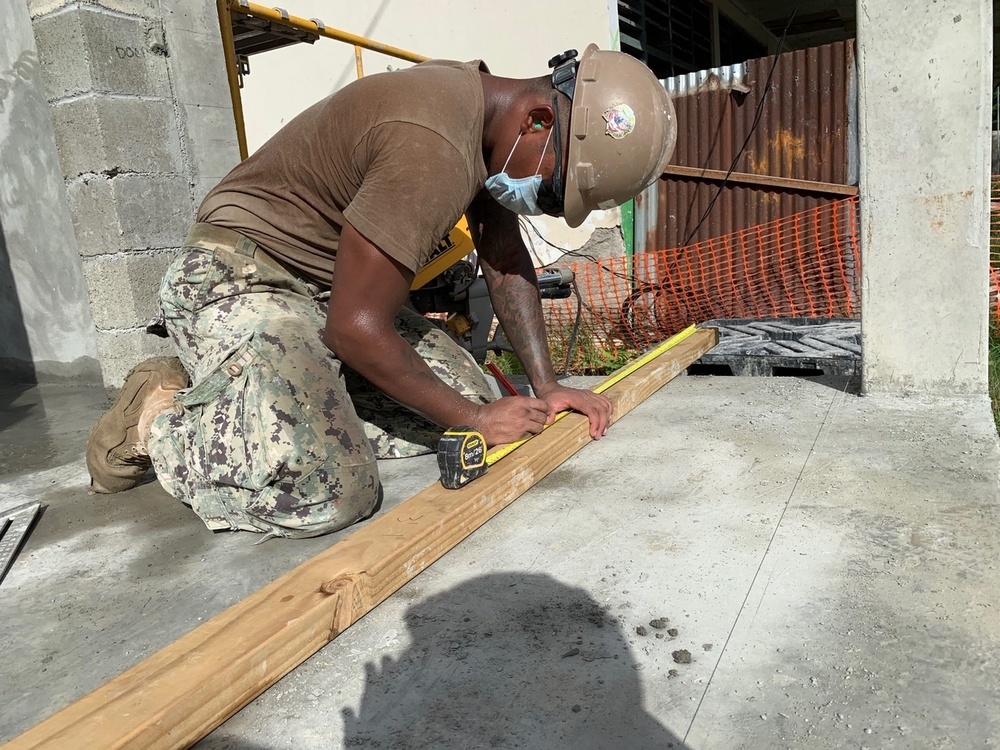 U.S. Navy Seabees with NMCB-5’s Detail Timor-Leste build a schoolhouse at Fatumeta’s school