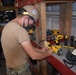 U.S. Navy Seabees from NMCB 5’s Detail Diego Garcia inventory gear