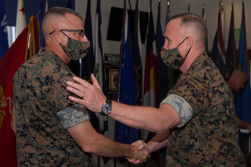 U.S. Marine Corps Col. Jerry Perry relinquishes command to U.S. Marine Corps Col. Matthew Tracy