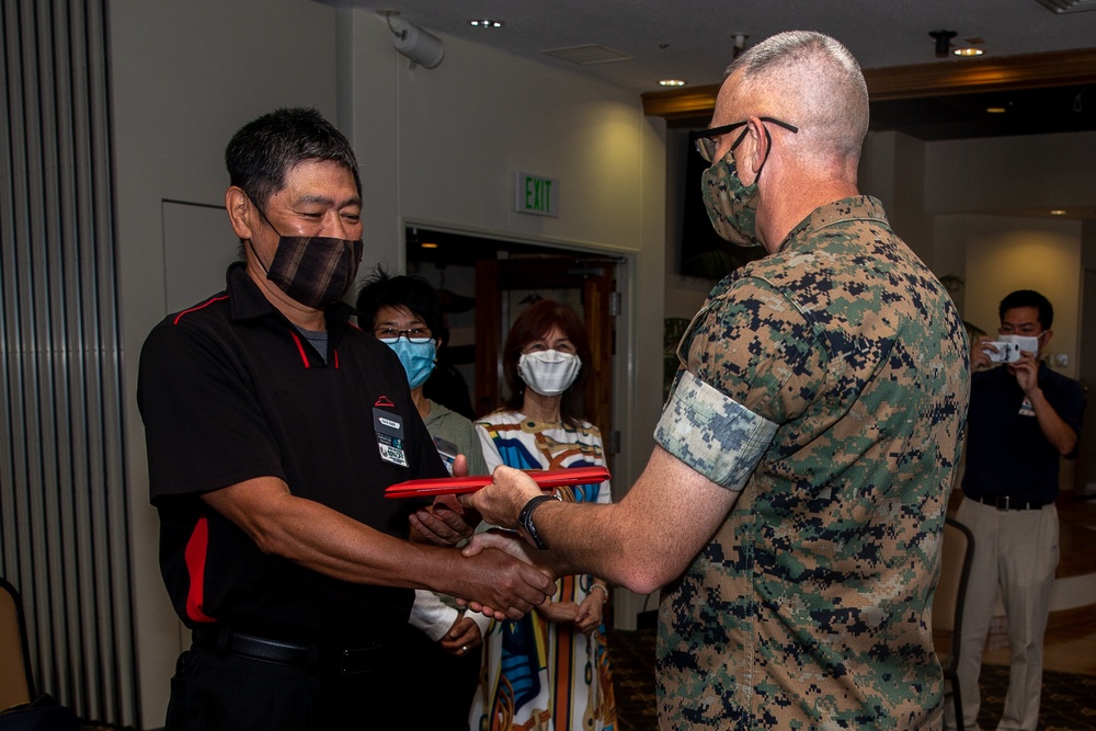 U.S. Marine Corps Col. Jason Perry presents awards during his change of command ceremony