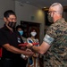 U.S. Marine Corps Col. Jason Perry presents awards during his change of command ceremony