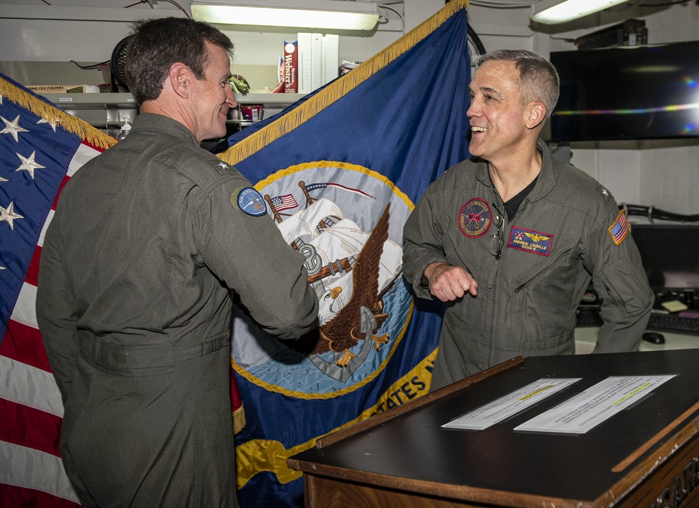 Commander, Carrier Strike Group (CSG) 8 holds a change of command.