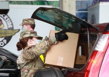 Food Pantry Volunteers Replace Race Pit Crews at Motor Speedway