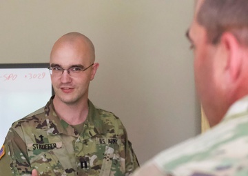 Chaplain Briefs Commander During COVID-19 Relief