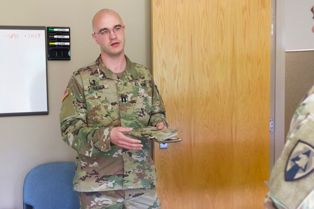 Chaplain Delivers Briefing During COVID-19 Relief