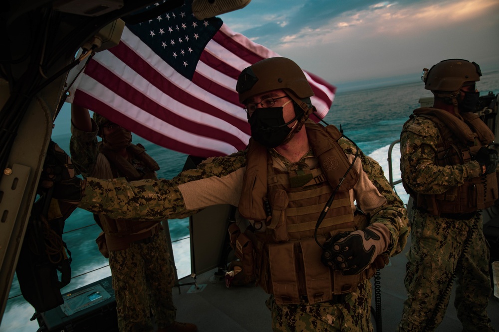 Sailors aboard a Mark VI Patrol Boat