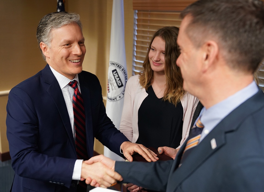 USAID/Uganda Mission Director, Richard Nelson swearing in ceremony