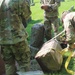 NY National Guard Soldiers repair World War 1 Guard Soldier's marker